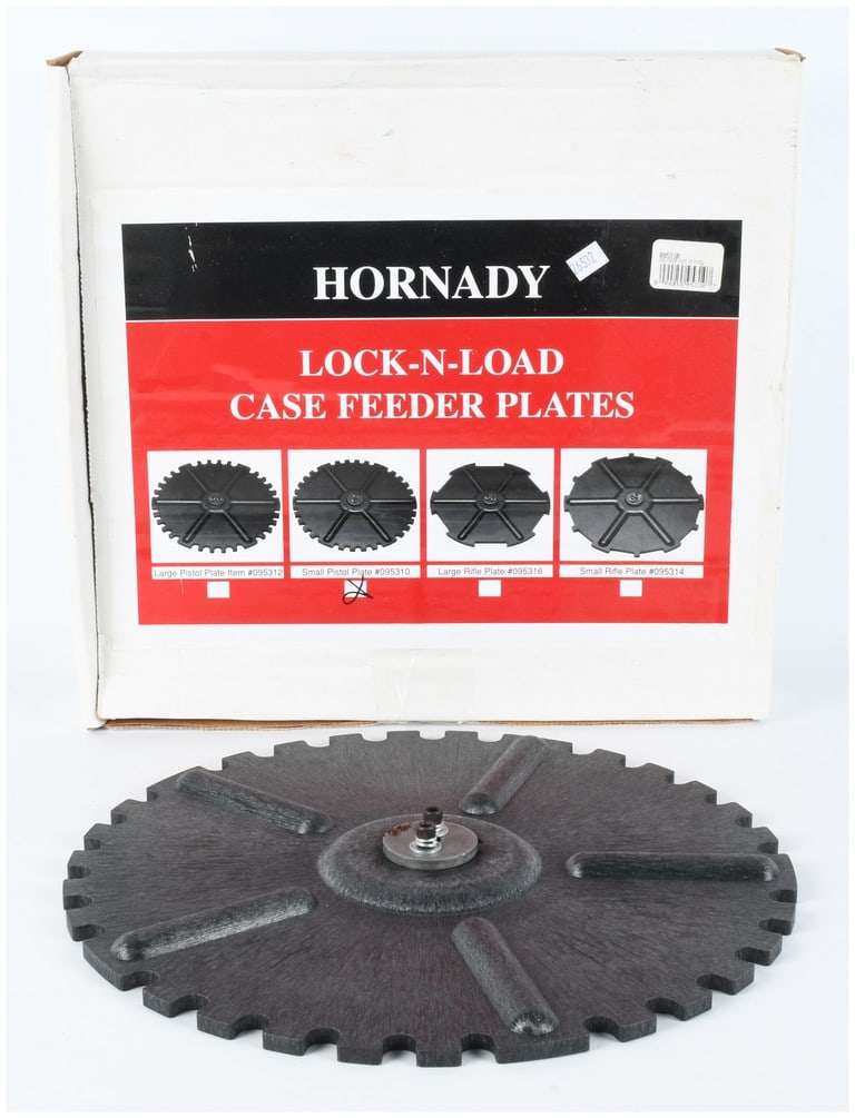 Hornady Lock-N-Load Small Pistol Case Feeder Plate 095310: This is a Hornady Lock-N-Load case feeder plate designed for small pistol calibers. The item is manufactured by Hornady for use with their proprietary ammunition reloading systems. The plate is constr