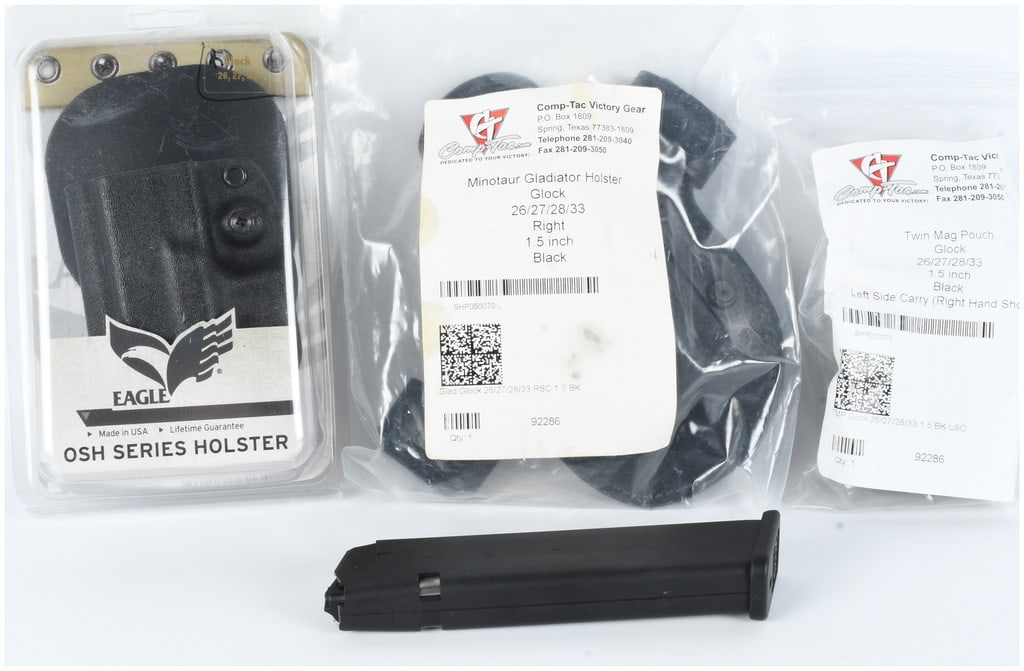 A Collection of Glock Handgun Accessories and Extended Magazine (1 of 9)