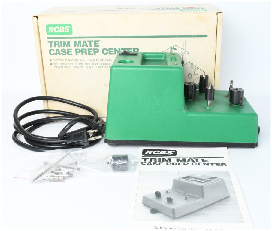 RCBS Trim Mate Case Prep Center with Original Box and Manual: This RCBS Trim Mate Case Prep Center is a motorized station designed for ammunition reloading tasks. The unit features a green plastic housing with the RCBS name molded in relief on the top surface. I