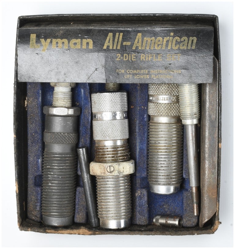 Lyman All-American 2-Die Rifle Reloading Set .270 Winchester: This lot consists of a Lyman All-American rifle reloading set for .270 Winchester, presented in its original factory box. The set contains a total of seven components, including three steel die bodies