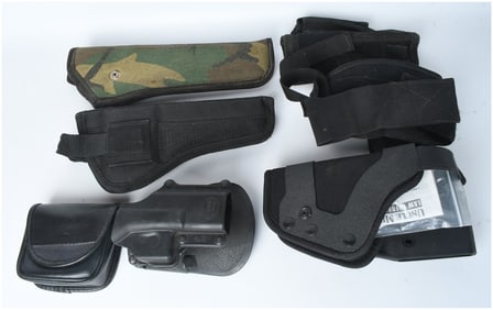A Collection of Fobus, Uncle Mike's, and Assorted Firearm Holsters and Accessories
