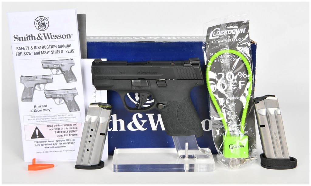 Smith & Wesson M&P Shield Plus Semi-Automatic Pistol .30 Super Carry with 3.125 Inch Barrel: This Smith & Wesson M&P Shield Plus is a semi-automatic striker-fired pistol chambered in .30 Super Carry featuring a 3.125-inch barrel. The firearm is finished in matte black on the slide with a blac
