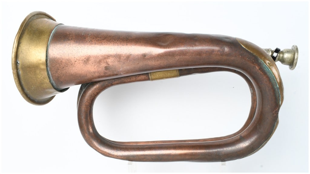 British Military Pattern 1885 Copper and Brass Field Bugle by Henry Potter and Co: A late Victorian era British military field bugle manufactured by Henry Potter and Co., 30 Charing Cross, London. The instrument is constructed with a copper body and brass fittings, including the bel