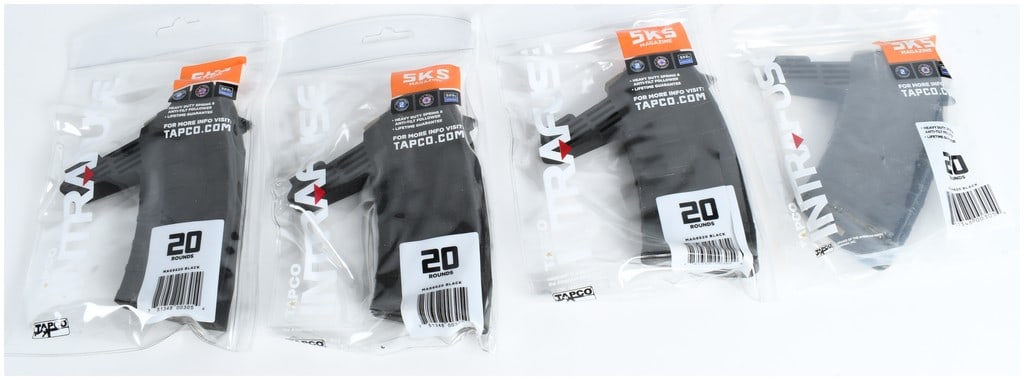 A Lot of 4 Tapco Intrafuse SKS 20-Round Magazines: This lot consists of four Tapco Intrafuse magazines designed for the SKS rifle chambered in 7.62x39mm. Each magazine features a 20-round capacity and is constructed from a durable black polymer. The i