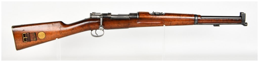 Carl Gustafs Stads Gevarsfaktori Model 1894/14 Bolt Action Carbine 6.5x55mm with 17.7 Inch Barrel: This Swedish Model 1894/14 bolt action carbine is chambered for the 6.5x55mm cartridge and is configured for military service. It features a 17.7 inch blued barrel and a full-length wooden stock typic