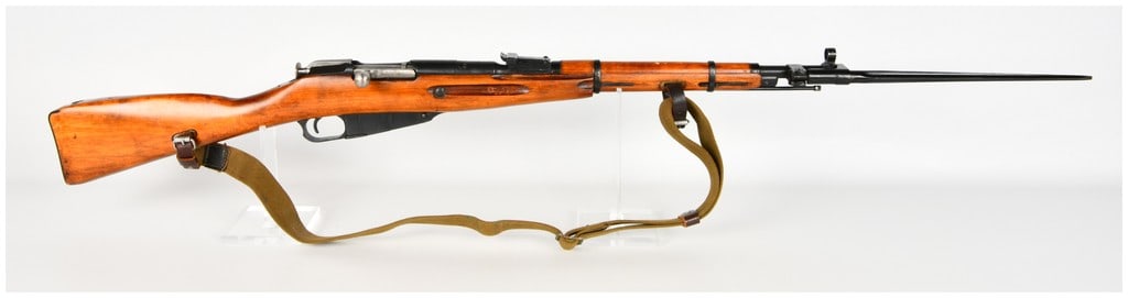 Izhevsk M44 Mosin-Nagant Bolt Action Carbine 7.62x54R with 20.25 Inch Barrel 1945: This Russian Izhevsk M44 Mosin-Nagant bolt action carbine is chambered in 7.62x54R and configured for military service. It features a 20.25-inch barrel equipped with an integral side-folding spike bay