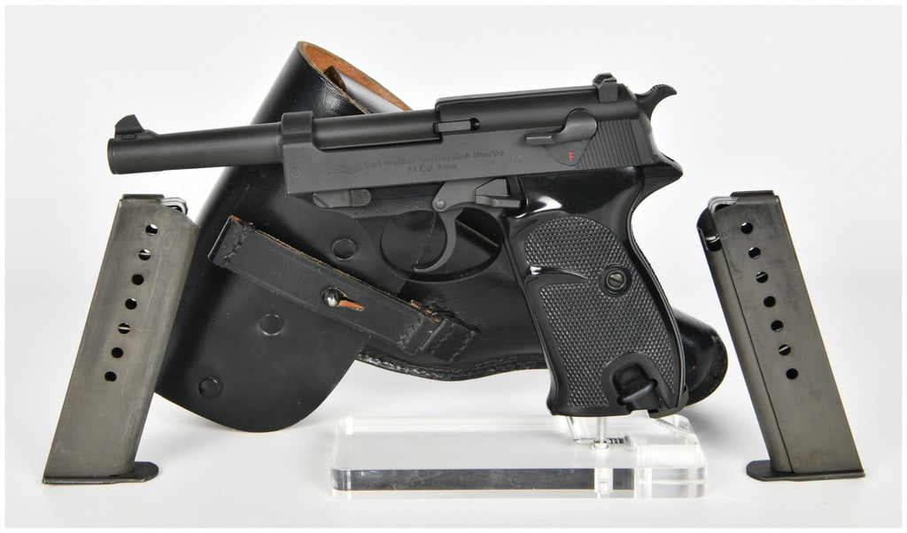 Walther P1 Semi-Automatic Pistol 9mm with 5 Inch Barrel: This lot features a Walther P1 semi-automatic pistol chambered in 9mm, representing the post-World War II evolution of the P38 design with a lightweight aluminum alloy frame. The pistol is equipped wi