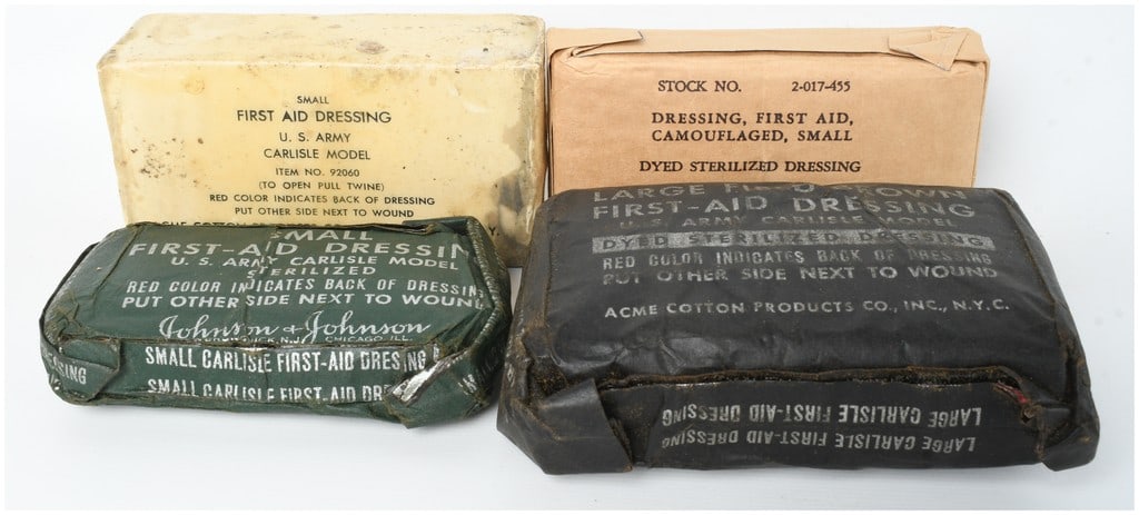 A Collection of Four WWII US Army Carlisle Model First Aid Dressings (1 of 5)