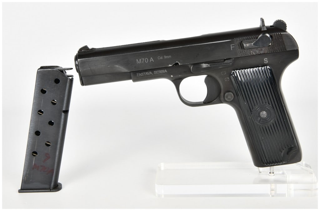 Zastava Model M70A Semi-Automatic Pistol 9mm with 4.5 Inch Barrel: This is a single Zastava Model M70A semi-automatic pistol chambered in 9mm, a modern variant of the Yugoslavian Tokarev design. The firearm features a 4.5-inch barrel and a blued steel finish on the s