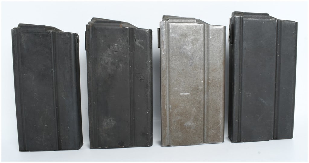A Lot of Four Springfield Armory and Unmarked M14 M1A 20-Round Box Magazines .308 Winchester: This lot features a collection of four 20-round steel box magazines for the M14 and M1A rifle platforms, chambered in 7.62x51mm NATO or .308 Winchester. Key markings include the Springfield Armory ord