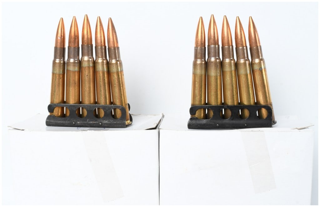 A Lot of 85 Rounds of .303 British Ammunition on Stripper Clips: This lot comprises eighty-five rounds of .303 British military-surplus ammunition organized onto five-round steel stripper clips. The cartridges are constructed with brass cases showing distinct annea