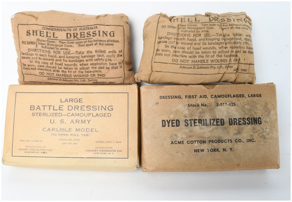 A Collection of World War II Commonwealth of Australia and United States Army Field Dressings: This collection consists of World War II era military medical field dressings from the Commonwealth of Australia and the United States Army. The Australian shell dressings are enclosed in tan cloth ju