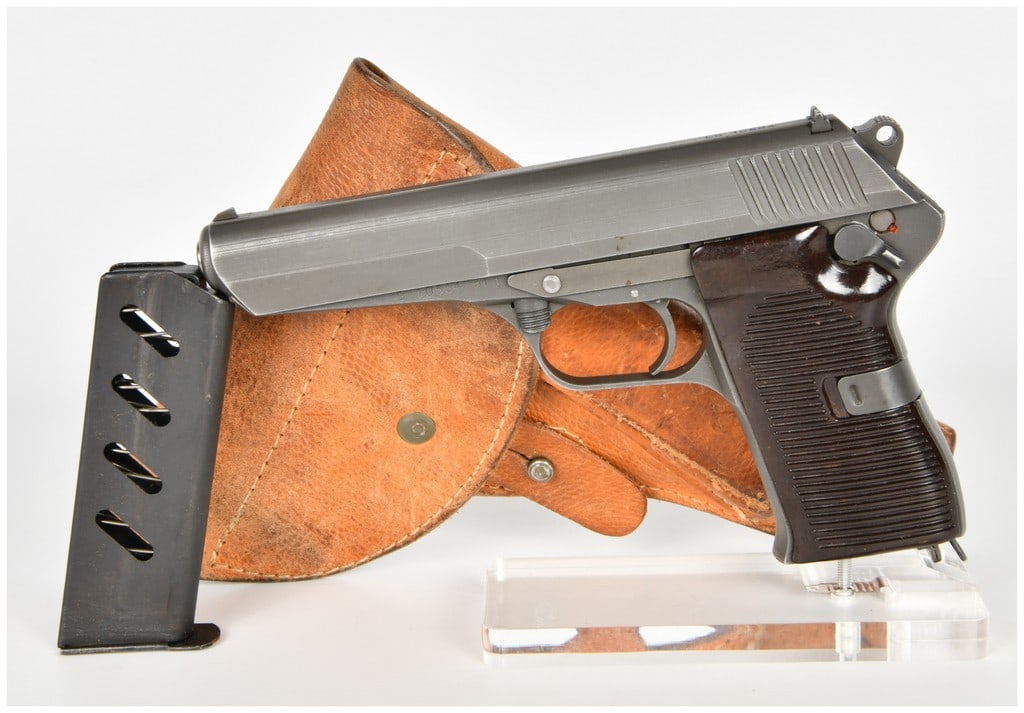 Ceska Zbrojovka Vz. 52 Semi-Automatic Pistol 7.62x25mm Tokarev with 4.7 Inch Barrel 1954: This roller-locked semi-automatic pistol is a Czechoslovakian Vz. 52, more commonly known as the CZ-52, chambered in the potent 7.62x25mm Tokarev cartridge. The firearm features a 4.7 inch barrel and 