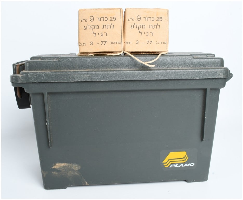 A Lot of 650 Rounds of IMI 9mm Submachine Gun Ammunition 1977: This lot consists of 650 rounds of 9mm Luger ammunition manufactured by Israel Military Industries (IMI) for use in submachine guns. The collection comprises 26 individual cardboard boxes, each contai
