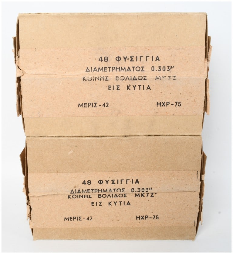 A Lot of 96 Rounds of Greek HXP .303 British Mark VII Z Ball Ammunition: This lot consists of 96 rounds of .303 British caliber ammunition produced by the Greek Powder and Cartridge Company (Pyrkal), partitioned into two 48-round cardboard boxes. The cartridges are loaded 