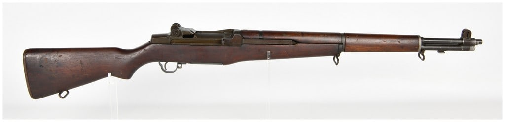 Springfield Armory M1 Garand Semi-Automatic Rifle .30 Caliber with 24 Inch Barrel: This Springfield Armory M1 Garand is a semi-automatic, gas-operated service rifle chambered in .30-06 Springfield. The rifle features a standard 24 inch barrel with a two-slot gas cylinder and a Parke