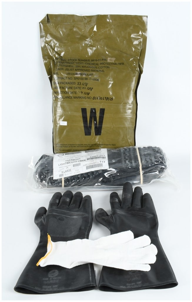A Set of NATO and US Military Unissued NBC/CBRN Protective Equipment: A collection of unissued chemical, biological, radiological, and nuclear (CBRN) protective equipment from the late 1990s and 2000s. This lot comprises components from the Joint Service Lightweight Int
