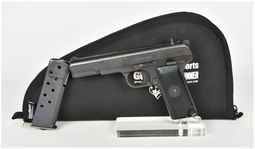Zastava M57 Semi-Automatic Pistol 7.62x25mm with 4.5 Inch Barrel: This is a Yugoslavian Zastava M57 semi-automatic pistol chambered in 7.62x25mm Tokarev, a variant of the Soviet TT-33 design. It features a 4.5 inch barrel and a blued steel finish on the slide and fr