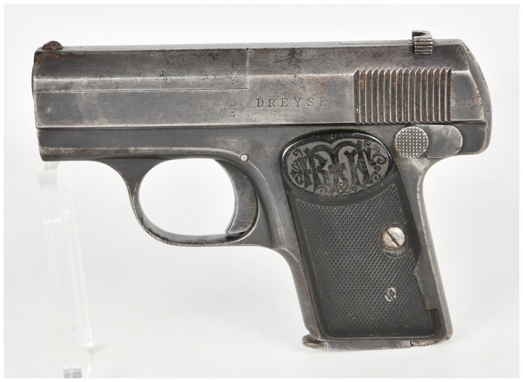 Dreyse Vest Pocket Model Semi-Automatic Pistol 6.35mm with 2 Inch Barrel: This Dreyse Vest Pocket semi-automatic pistol is chambered in 6.35mm, also known as .25 ACP, and features a standard 2 inch barrel. The pistol is a classic example of early 20th-century German pocket
