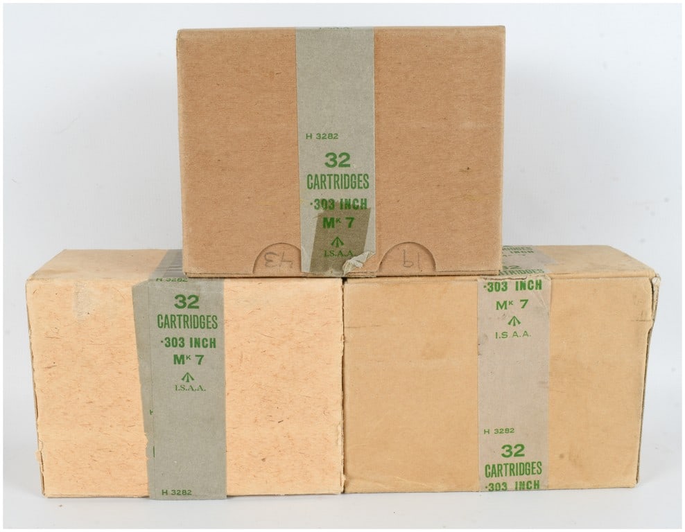 Union of South Africa Mk 7 .303 Inch Ammunition 1942: This lot consists of 96 rounds of .303 caliber ammunition, organized into three original cardboard boxes with 32 cartridges per box. The ammunition is the Mk 7 pattern, featuring rimmed brass cases lo