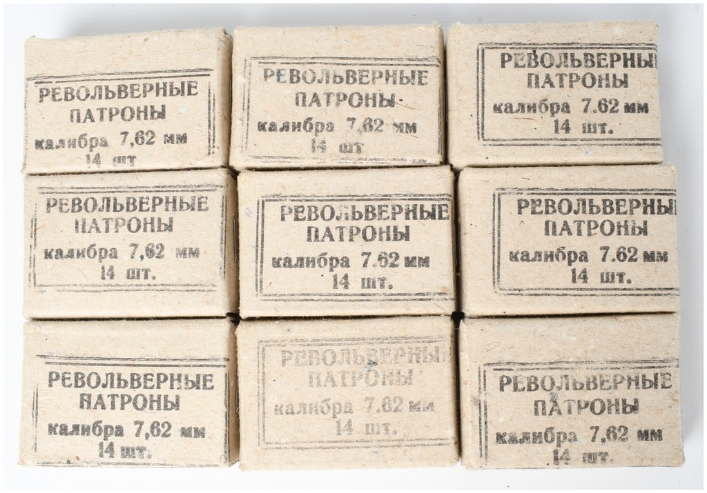 A Lot of 140 Rounds of Soviet M1895 Nagant Revolver Ammunition 7.62x38mmR: This lot consists of 140 rounds of Soviet-era 7.62x38mmR ammunition, distributed across ten individual cardboard boxes containing 14 rounds each. These cartridges are specifically intended for use in 