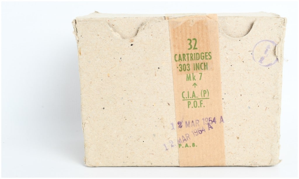A Lot of 32 Pakistan Ordnance Factories Mk 7 Ammunition .303 British 1964: This lot features 32 cartridges of .303 British caliber ammunition produced by Pakistan Ordnance Factories. These Mark 7 pattern cartridges are constructed with brass cases and copper-jacketed spitzer