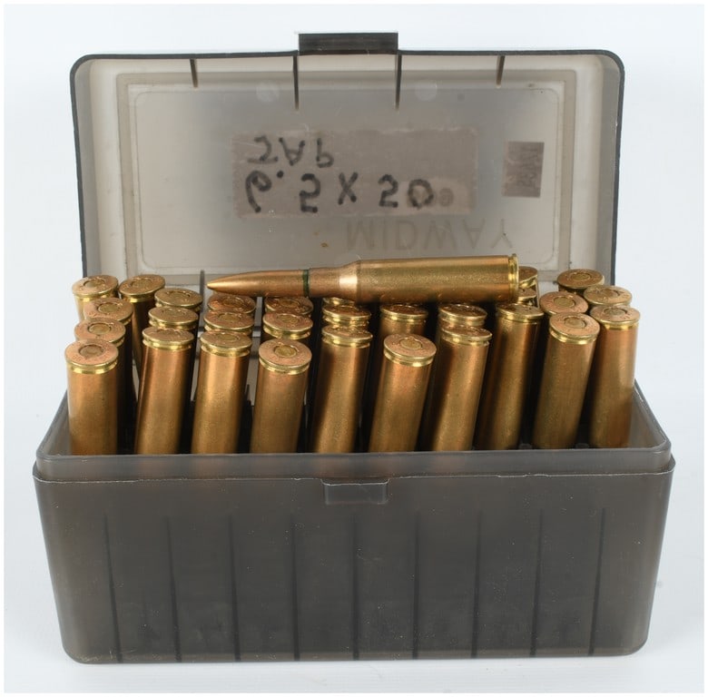 A Lot of 38 Rounds of 6.5x50mm Jap Ammunition: This lot features a collection of 38 rounds of 6.5x50mm Jap ammunition, a caliber intended for use in Japanese military rifles such as the Arisaka series. The cartridges are housed in a translucent gr