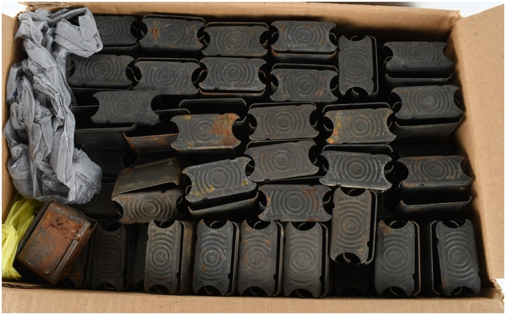 A Packed Box Full of Vintage USGI M1 Garand 8-Round En Bloc Clips: A large collection of vintage M1 Garand 8-round en bloc clips, manufactured from stamped spring steel. These clips are the standard ammunition feeding device for the .30-06 caliber M1 Garand service r
