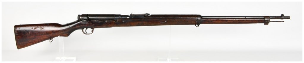 Nagoya Arsenal Arisaka Type 99 Bolt Action Rifle 7.7x58mm Arisaka with 26 Inch Barrel: This Japanese Arisaka Type 99 bolt-action rifle, manufactured at the Nagoya Arsenal, is chambered in 7.7x58mm Arisaka and features a 26-inch barrel. Key markings include a defaced Imperial chrysanthem
