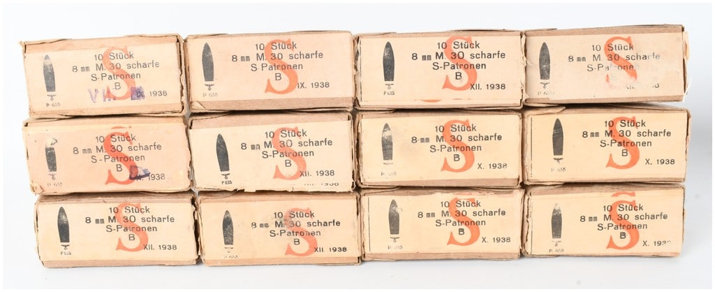 A Lot of 120 Rounds of Hirtenberg 8mm M.30 Ammunition 8mm Mauser 1938: This lot consists of twelve original cardboard boxes containing a total of 120 rounds of 8mm Mauser ammunition, accompanied by two five-round steel en-bloc clips. The cartridges are specifically ident