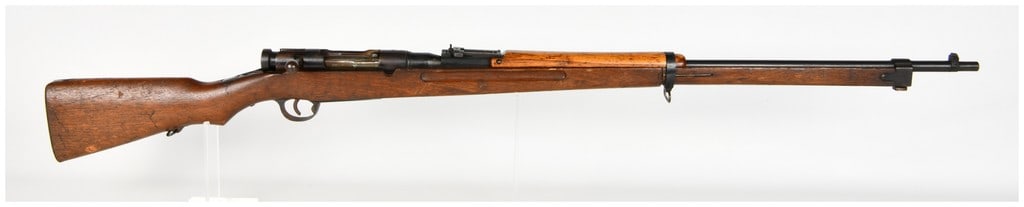 Kokura Arsenal Training Bolt Action Rifle Smooth Bore: This Japanese bolt-action training rifle is modeled after the Arisaka service rifle and features a smooth bore barrel intended for training or blank ammunition. The receiver is marked with the Kokura 