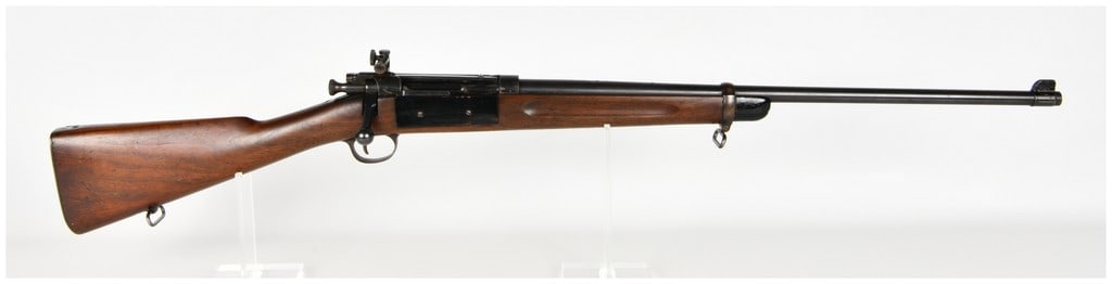Springfield Armory Model 1898 Krag-Jorgensen Gallery Practice Bolt Action Training Rifle .22 Caliber: This is a single Springfield Armory Model 1898 Krag-Jorgensen bolt action training rifle chambered in .22 LR. The rifle features a round barrel with a thinning blued finish and a blade front sight