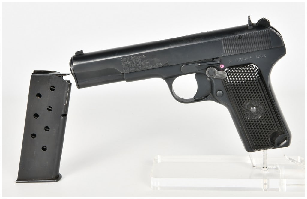 Cugir Model TTC Semi-Automatic Pistol 7.62x25mm with 4.6 Inch Barrel 1956: This lot features a Romanian TTC semi-automatic pistol, a robust derivative of the Soviet Tokarev TT-33, chambered in the high-velocity 7.62x25mm Tokarev cartridge. Designed for service use, it