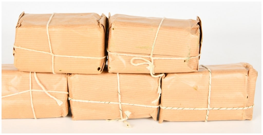 Approximately 100 Rounds of Soviet 7.62x54mmR Military Surplus Ammunition, 1987: This lot features five original paper-wrapped bundles containing approximately 100 rounds of Soviet 7.62x54mmR military surplus ammunition. Each bundle typically holds 20 rounds of 7.62x54r, a caliber