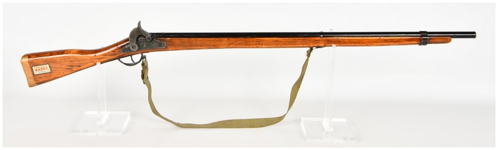 Parris Manufacturing Co. Civil War Kadet Musket Hammer Action Toy Training Rifle with 37 Inch: This lot features a Parris Manufacturing Co. Civil War Kadet Musket toy training rifle, a non-firing replica measuring 37 inches in overall length. The item is constructed with a wooden stock featurin
