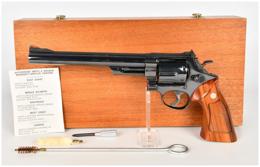 Smith & Wesson Model 29-2 Double-Action Revolver .44 Magnum with 8-3/8 Inch Barrel: This auction lot features one Smith & Wesson Model 29-2 double-action revolver chambered in .44 Magnum. The firearm is configured with an 8-3/8 inch barrel and a six-shot cylinder. The metal surfaces 