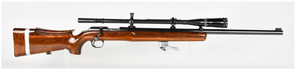 Remington Model 37 Bolt Action Target Rifle .22 LR with Custom Womack Barrel: This Remington Model 37 bolt action target rifle is chambered for .22 Long Rifle and is configured for precision competitive shooting with a heavy custom barrel and high-grade furniture. The rifle fea