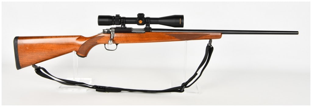 Ruger Model 77/17 Bolt Action Rifle .17 HMR with 22 Inch Barrel: This is a Ruger Model 77/17 bolt-action rifle chambered for the .17 HMR cartridge, designed as a precision rimfire platform for small game hunting and target shooting. The rifle features a 22-inch blu