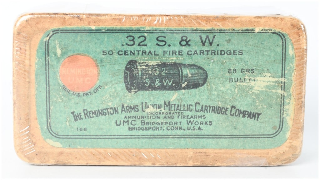 A Lot of 50 Remington UMC .32 S.&W. Black Powder Centerfire Cartridges: This lot comprises a vintage two-piece cardboard box containing 50 rounds of Remington-UMC .32 S.&W. black powder ammunition. The green top label is printed with .32 S. & W. / 50 CENTRAL FIRE CARTRIDG