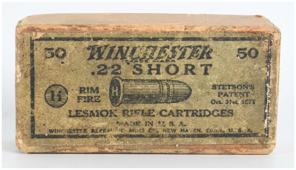 Winchester .22 Short Rimfire Ammunition 50 Rounds 1920: This lot features 50 rounds of Winchester .22 Short rimfire ammunition presented in its original two-piece cardboard box. The assembly consists of a sliding inner tray and an outer sleeve with printed