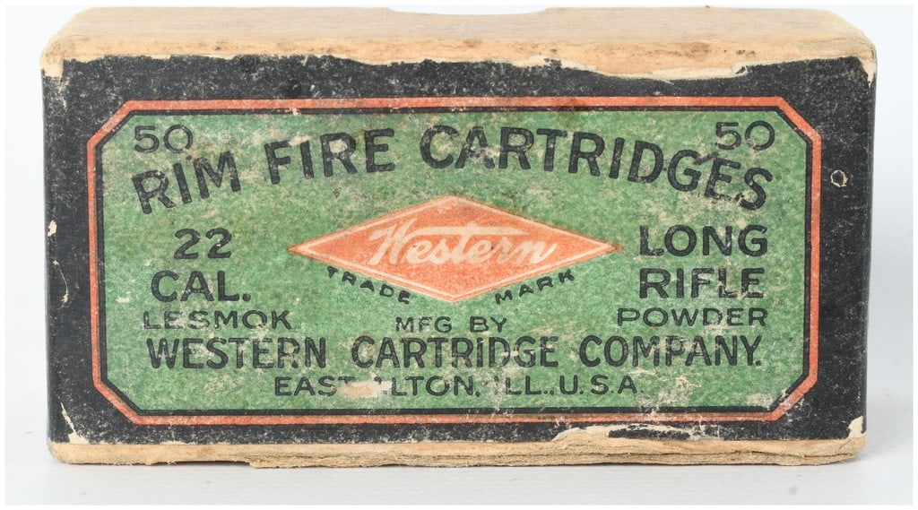 Western Cartridge Company 22 Long Rifle Lesmok Rimfire Ammunition 50 Rounds: This lot consists of 50 rounds of 22 caliber Long Rifle ammunition manufactured by the Western Cartridge Company in East Alton, Illinois. The cartridges are contained within a two-piece cardboard box 