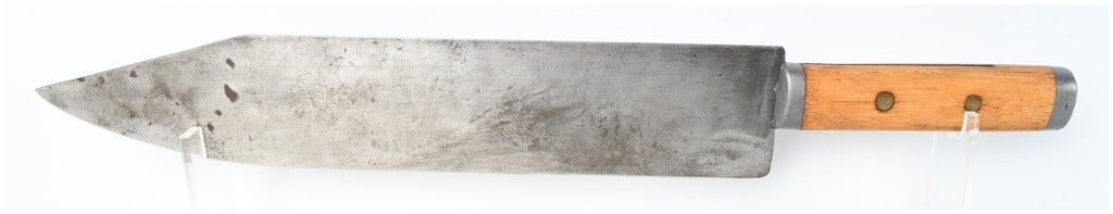 Large Vintage Carbon Steel Fixed-Blade Utility Knife: A single large vintage fixed-blade knife featuring a carbon steel blade with a clip-point profile. The knife is constructed with a hardwood handle, possibly oak, secured to the tang with two brass pin