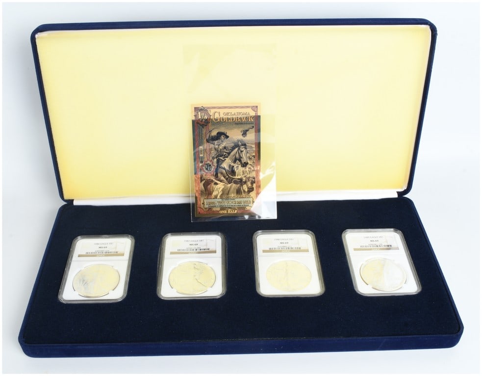 A Set of Graded American Eagle Silver Dollars and an Oklahoma Goldback Gold Foil Note (1 of 9)