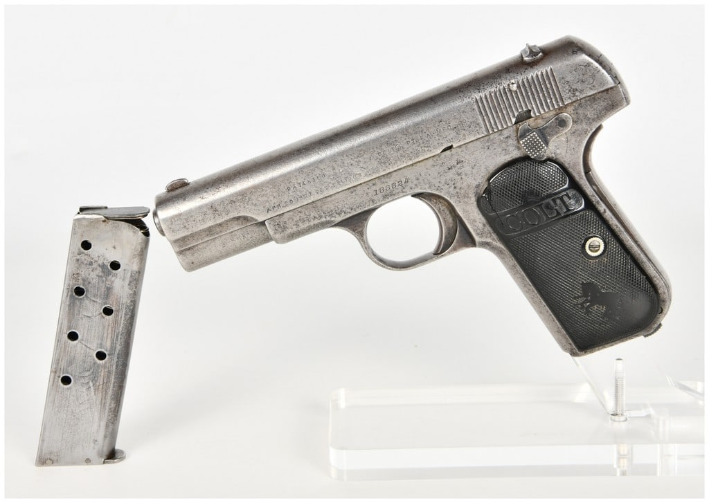 Colt Model 1903 Pocket Hammerless Semi-Automatic Pistol .32 ACP with 3.75 Inch Barrel 1915: This is a Colt Model 1903 Pocket Hammerless semi-automatic pistol chambered in .32 caliber, specifically marked for .32 Rimless Smokeless cartridges. Manufactured in 1915, this Type III variation feat