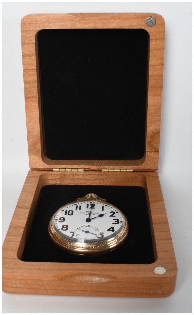 Ball-Hamilton 16-Size Model 999P Ultra Railroad-Grade Pocket Watch with Engraved Box: One Ball-Hamilton 16-size Model 999P Ultra railroad-grade pocket watch accompanied by a wooden presentation box. The watch features a white enamel dial marked Ball Official RR Standard Cleveland with 