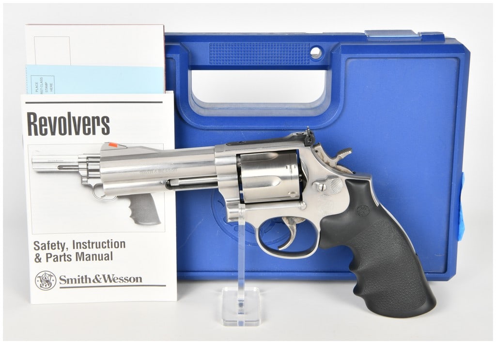 Smith & Wesson Model 686-4 Double Action Revolver .357 Magnum with 4 Inch Barrel: This Smith & Wesson Model 686-4 is a double action revolver chambered in .357 Magnum, designed for both duty and sporting use. The firearm features an approximately 4-inch barrel with a full-length un