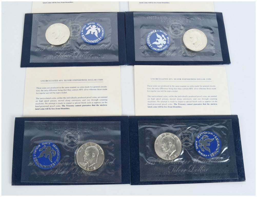 Four US 40% Silver Eisenhower Uncirculated Blue Pack Dollars 1972-S and 1973-S (1 of 10)