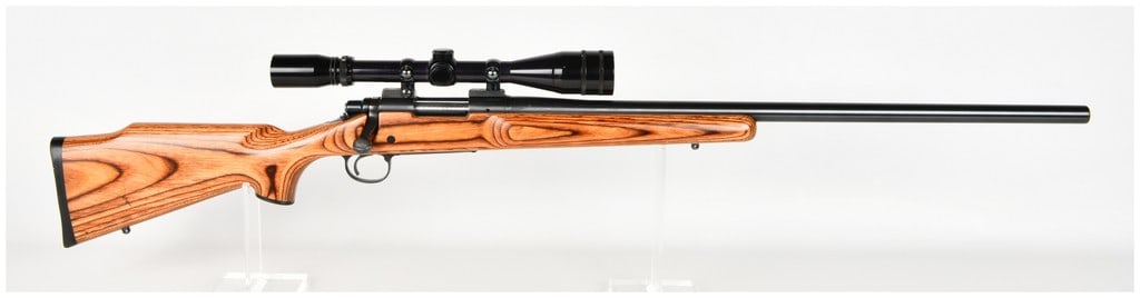 Remington Model 700 VLS Bolt Action Rifle .223 Remington with 26 Inch Barrel: This is a Remington Model 700 VLS (Varmint Laminated Stock) bolt-action rifle chambered in .223 Remington, designed for precision target shooting and varmint hunting. The firearm features a 26-inch he
