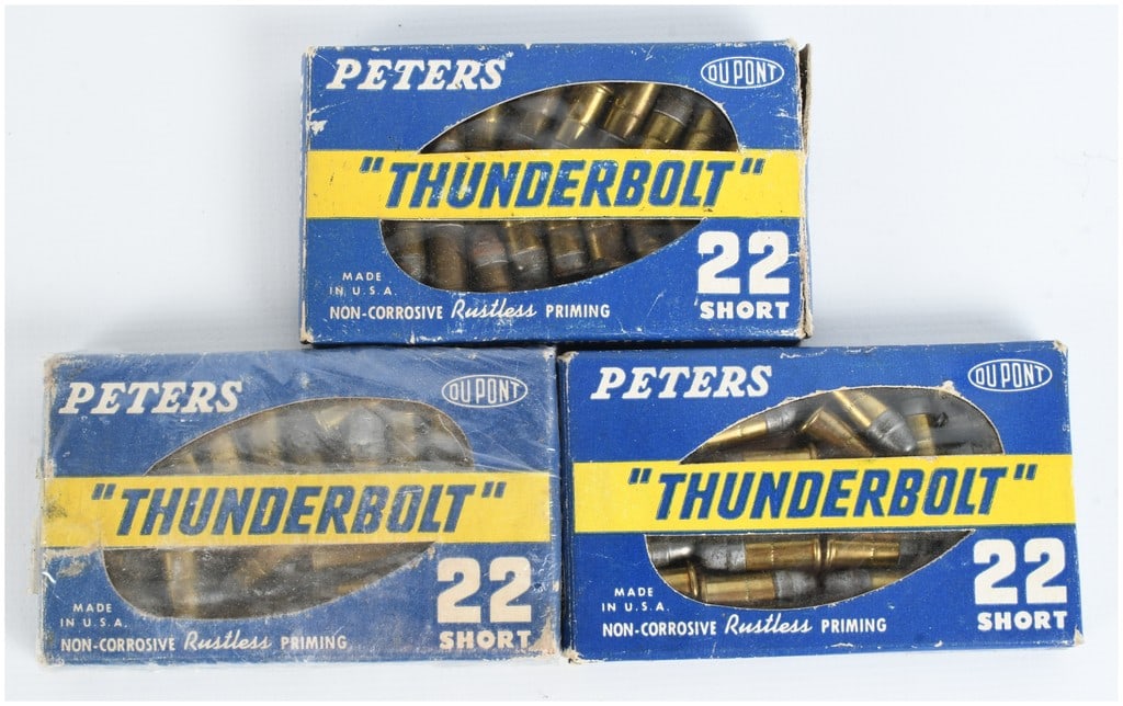A Trio of Peters Thunderbolt .22 Short Rimfire Ammunition Boxes: This lot features a collection of three boxes of Peters Thunderbolt .22 Short caliber rimfire ammunition, with each box containing twenty-eight cartridges for a total count of eighty-four rounds. The 