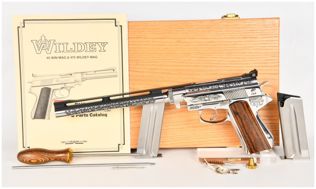 Wildey Survivor Semi-Automatic Pistol .45 Winchester Magnum with 10 Inch Barrel: This lot features a gas-operated semi-automatic pistol manufactured by Wildey and chambered in .45 Winchester Magnum. The firearm is configured with a 10 inch barrel featuring a full-length vented rib